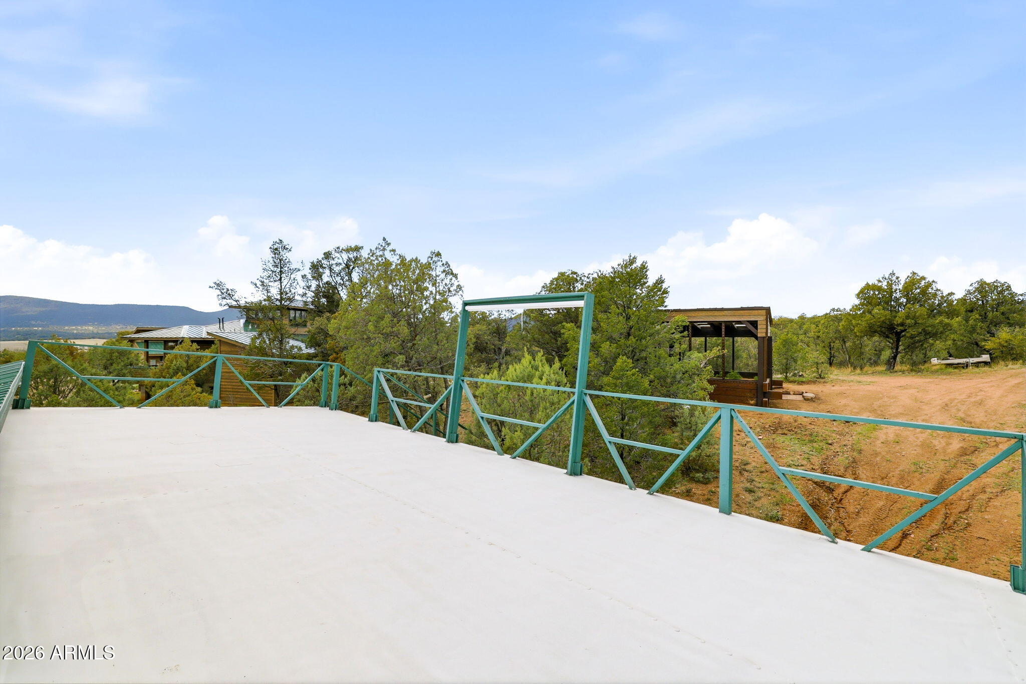 84 Mail Trail Road Young, AZ 85554 - Photo 32 of 57 Movie Theatre Deck over Carport