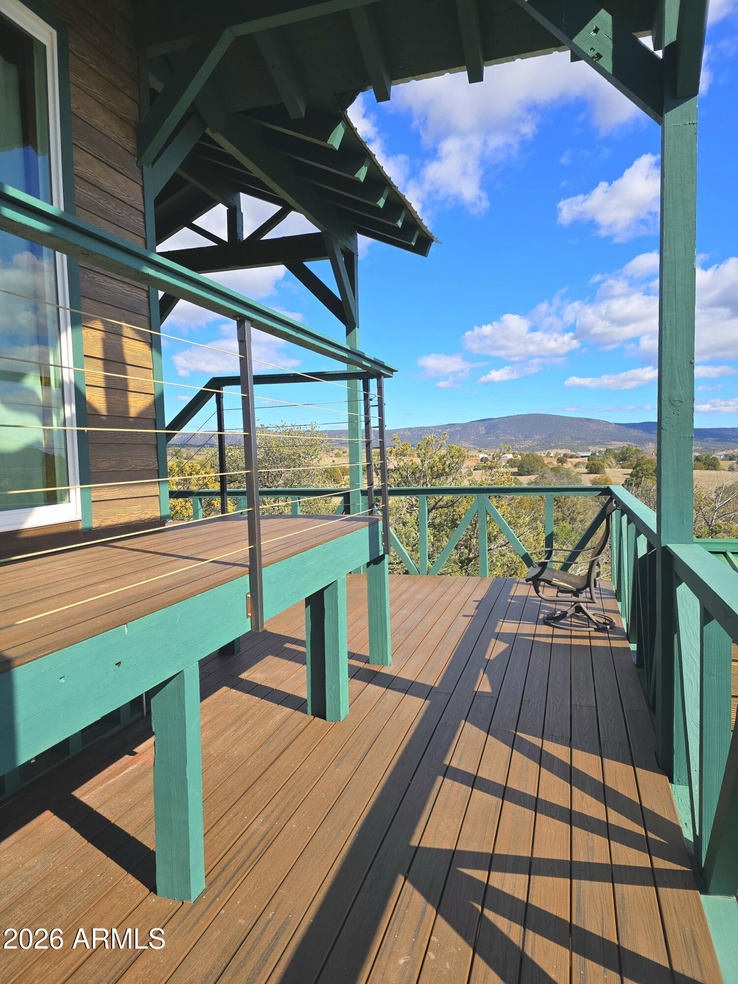 84 Mail Trail Road Young, AZ 85554 - Photo 38 of 57 a view of a balcony with wooden floor