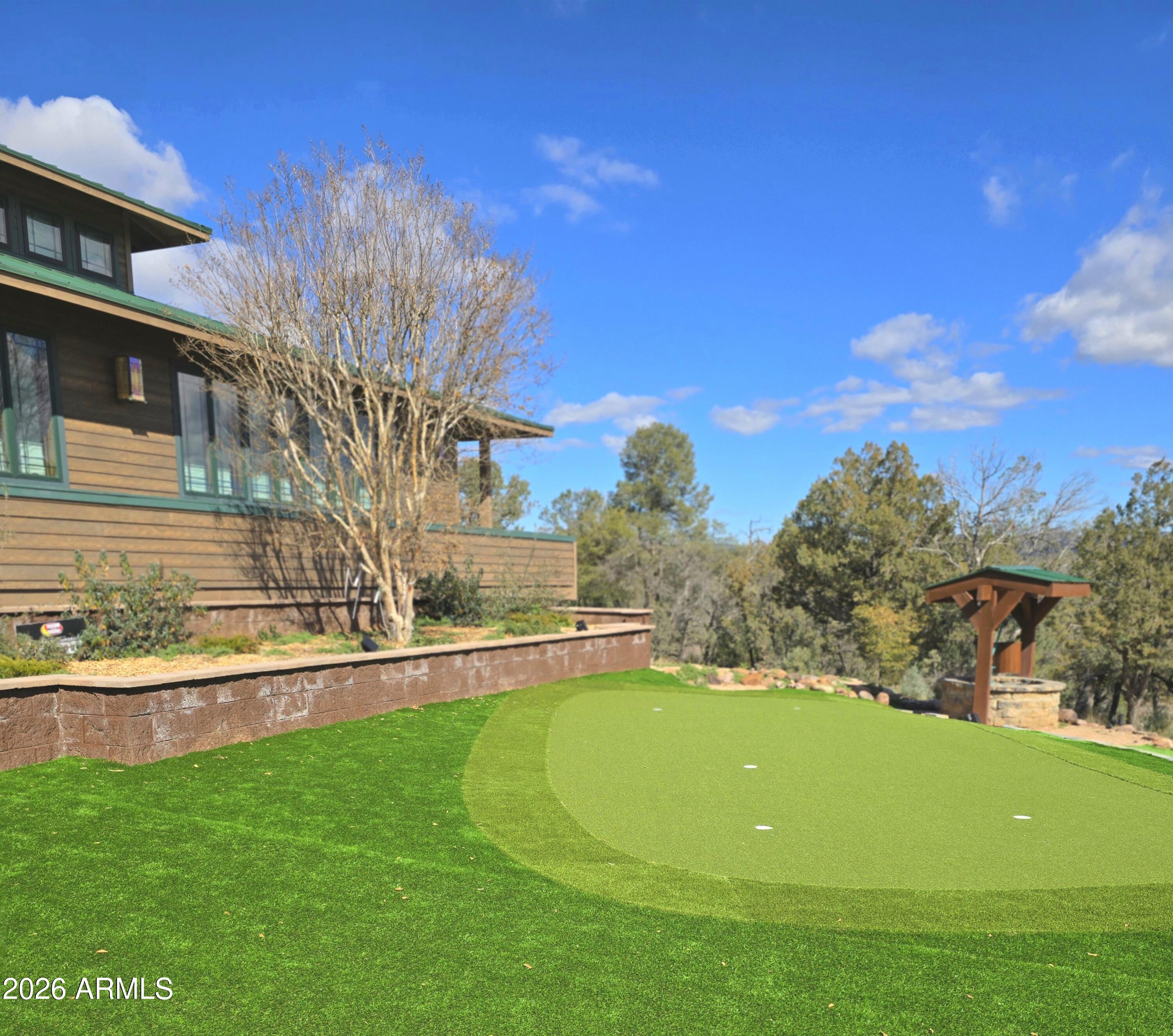 84 Mail Trail Road Young, AZ 85554 - Photo 3 of 57 a view of a golf course with a lake view