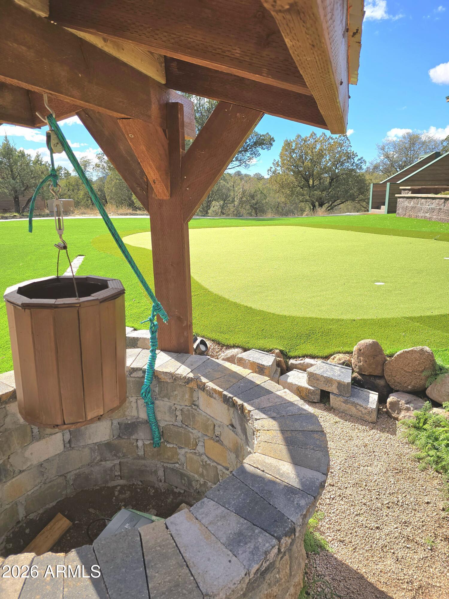 84 Mail Trail Road Young, AZ 85554 - Photo 51 of 57 Wishing Well & Putting Green
