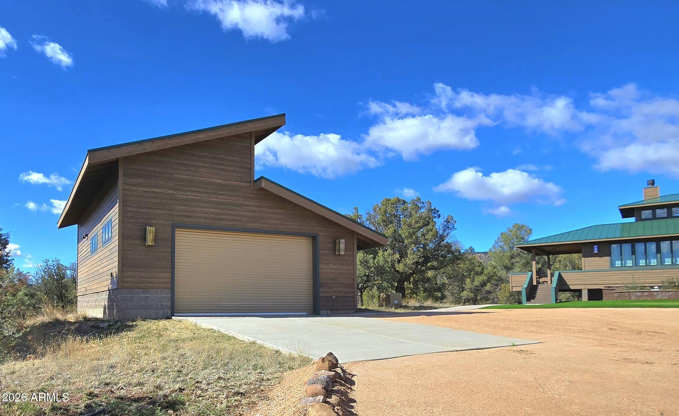 84 Mail Trail Road Young, AZ 85554 - Photo 53 of 57 a front view of a house with a yard