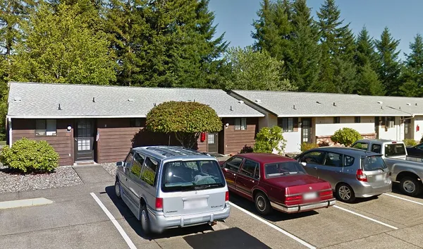 a car parked in front of a house