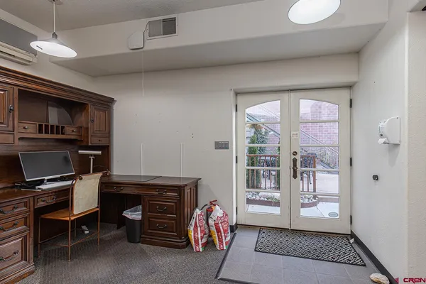 a room with furniture and a window