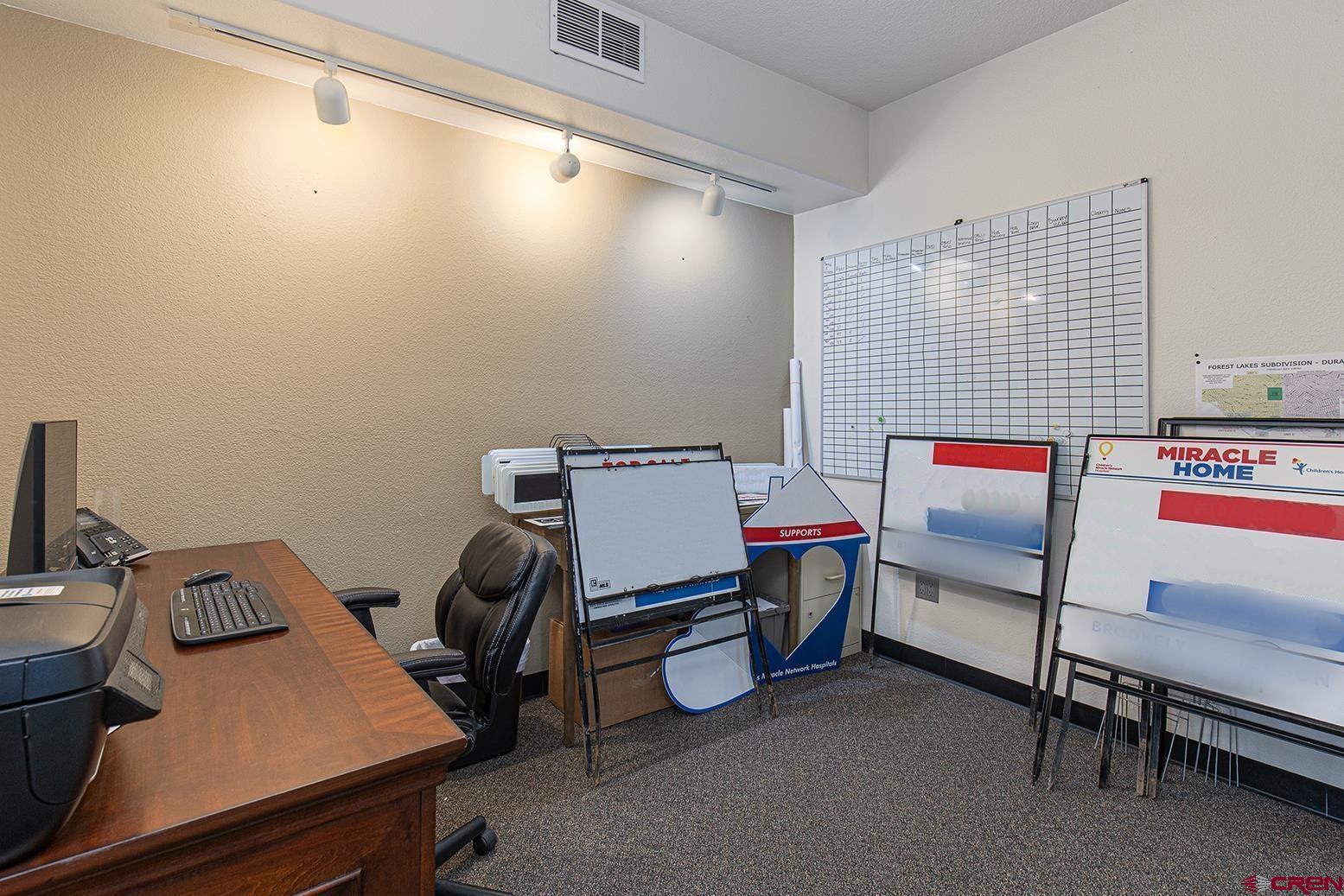 1221 Main Avenue Durango, CO 81301 - Photo 28 of 31 a room with furniture and a air conditioner vent