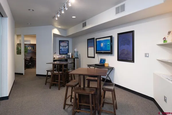 a view of a dining room with furniture