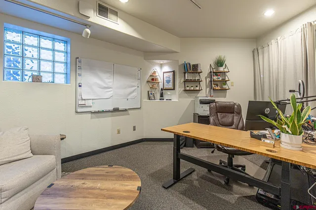 a room with furniture and window