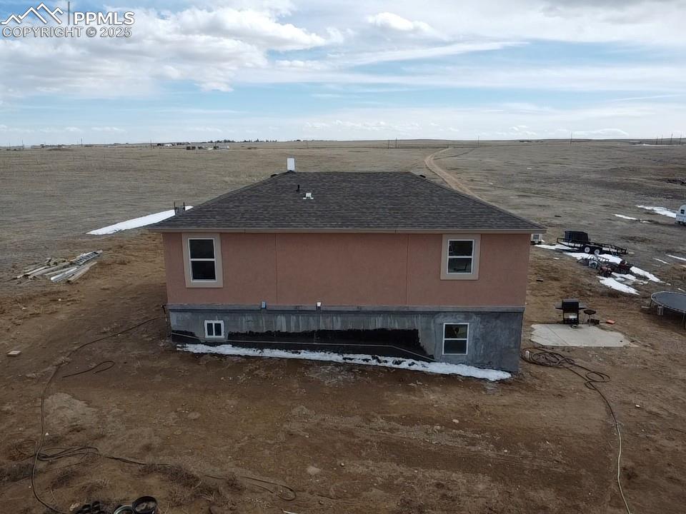 32174 Torrence Road Yoder, CO 80864 - Photo 13 of 27 a view of a house with a terrace