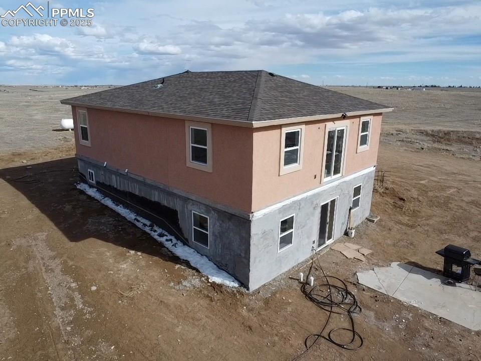 32174 Torrence Road Yoder, CO 80864 - Photo 16 of 27 a aerial view of a house with a yard