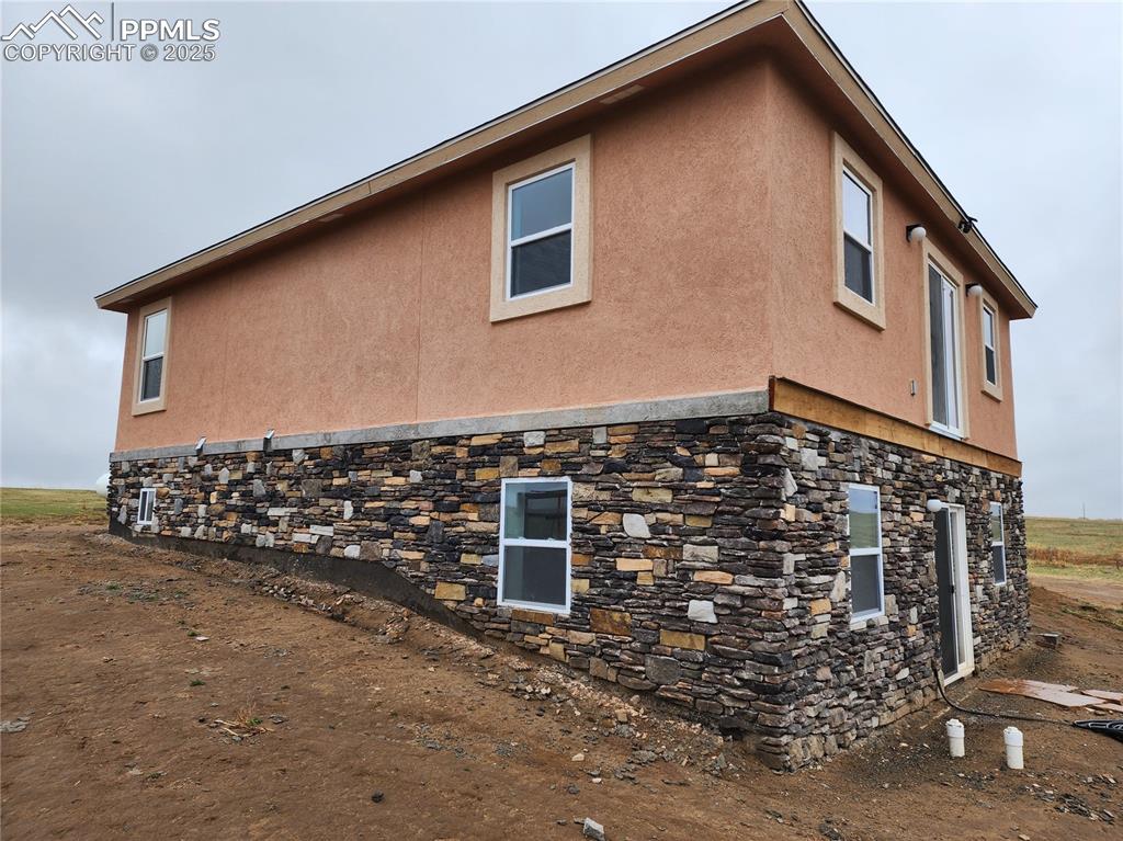 32174 Torrence Road Yoder, CO 80864 - Photo 4 of 27 a front view of a house