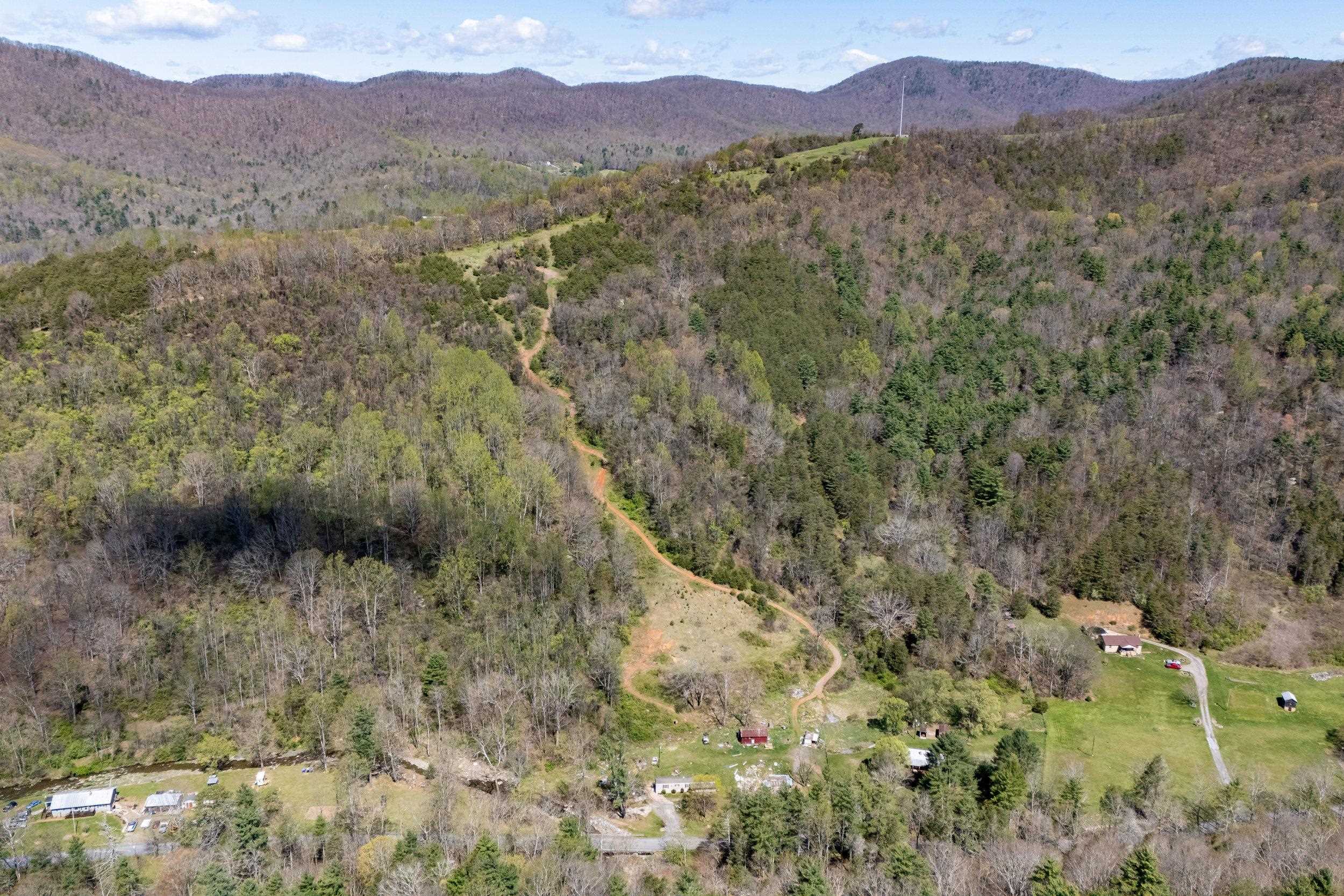 Off Jollett Road Elkton, VA 22827 - Photo 4 of 65 a view of a lush green hillside and a houses