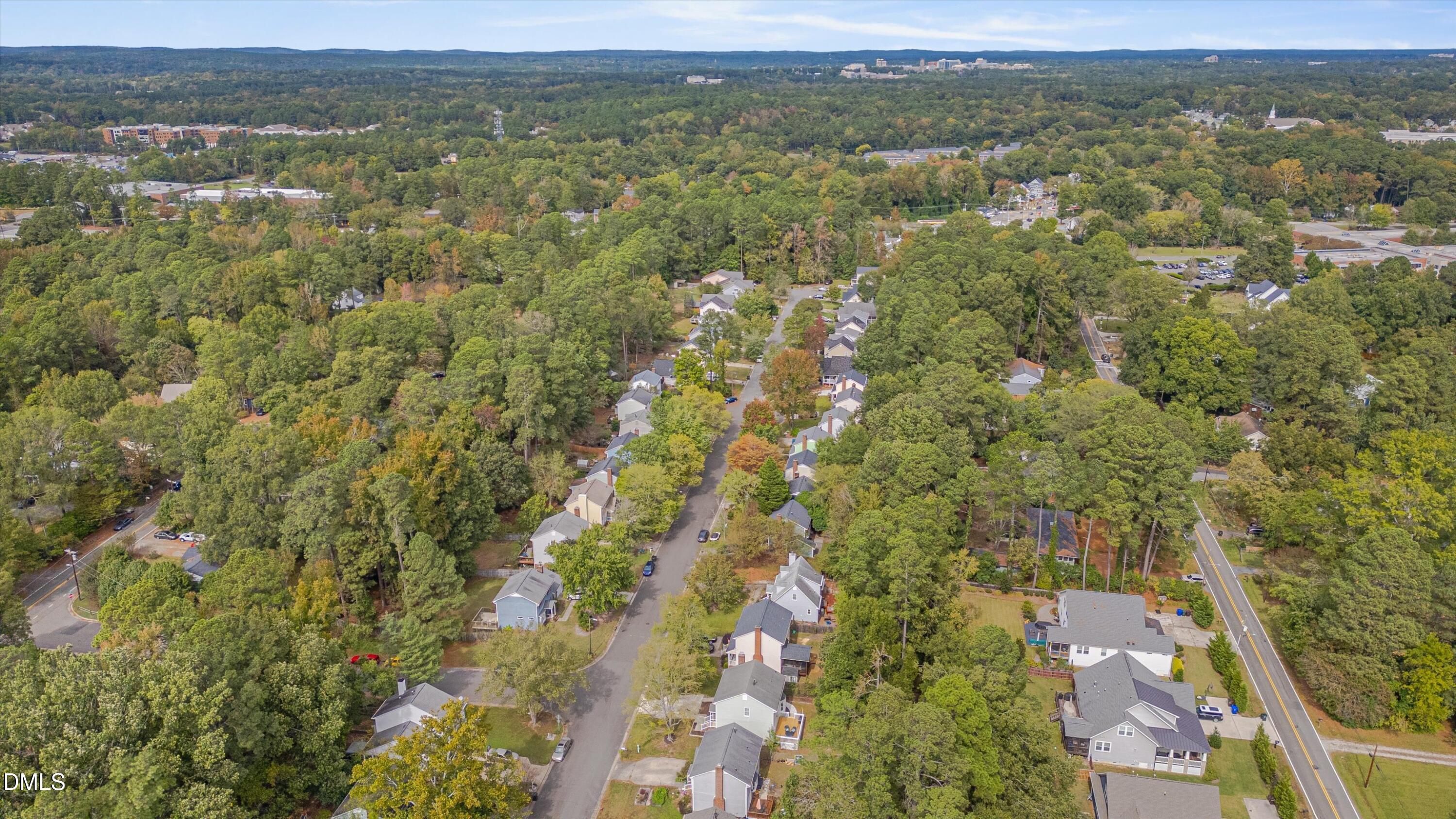 3301 Lassiter Street Durham, NC 27707 - Photo 31 of 32 an aerial view of residential houses with outdoor space and trees