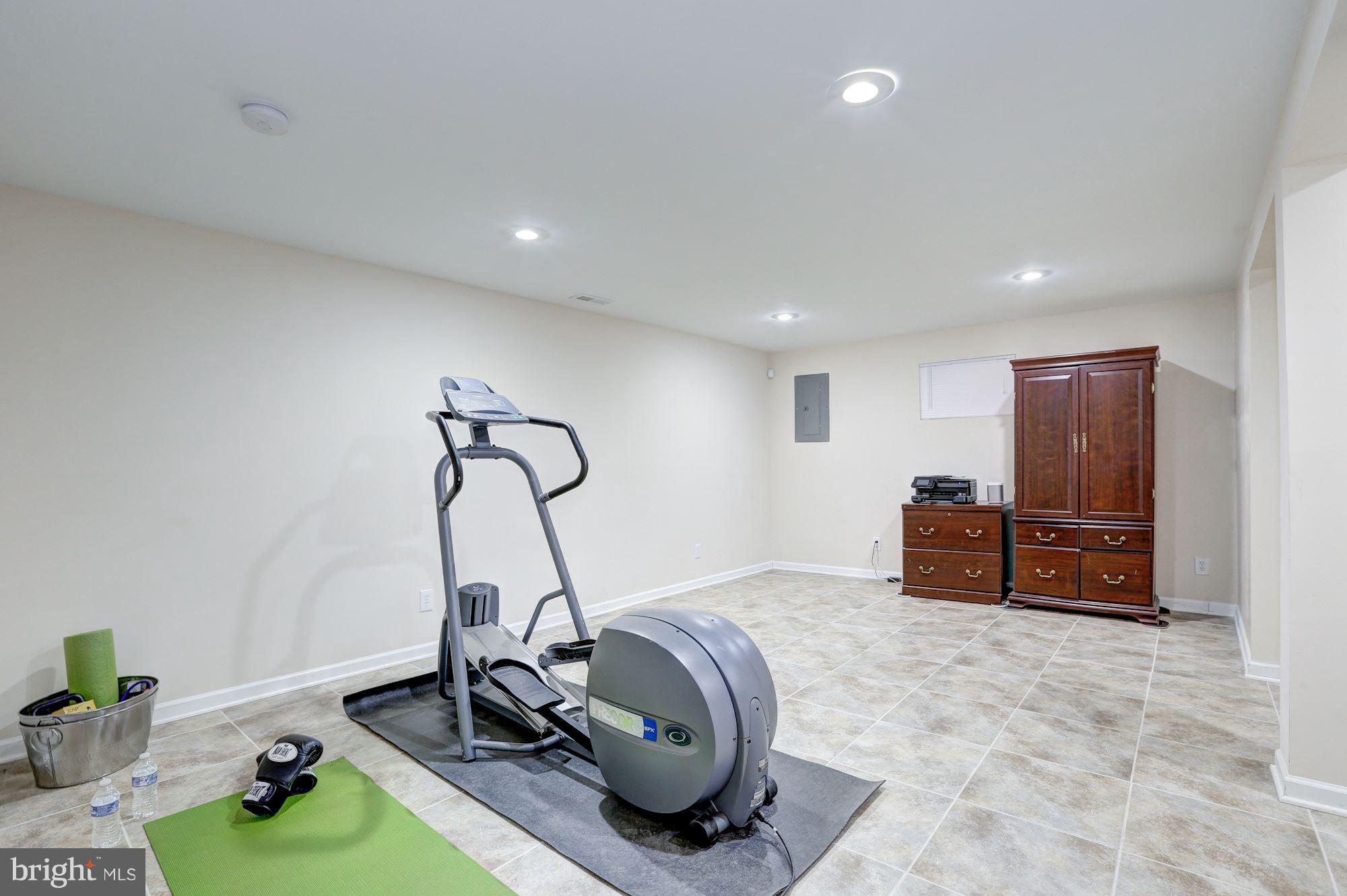 13108 Holdridge Road Silver Spring, MD 20906 - Photo 22 of 30 a room with furniture and air hockey table