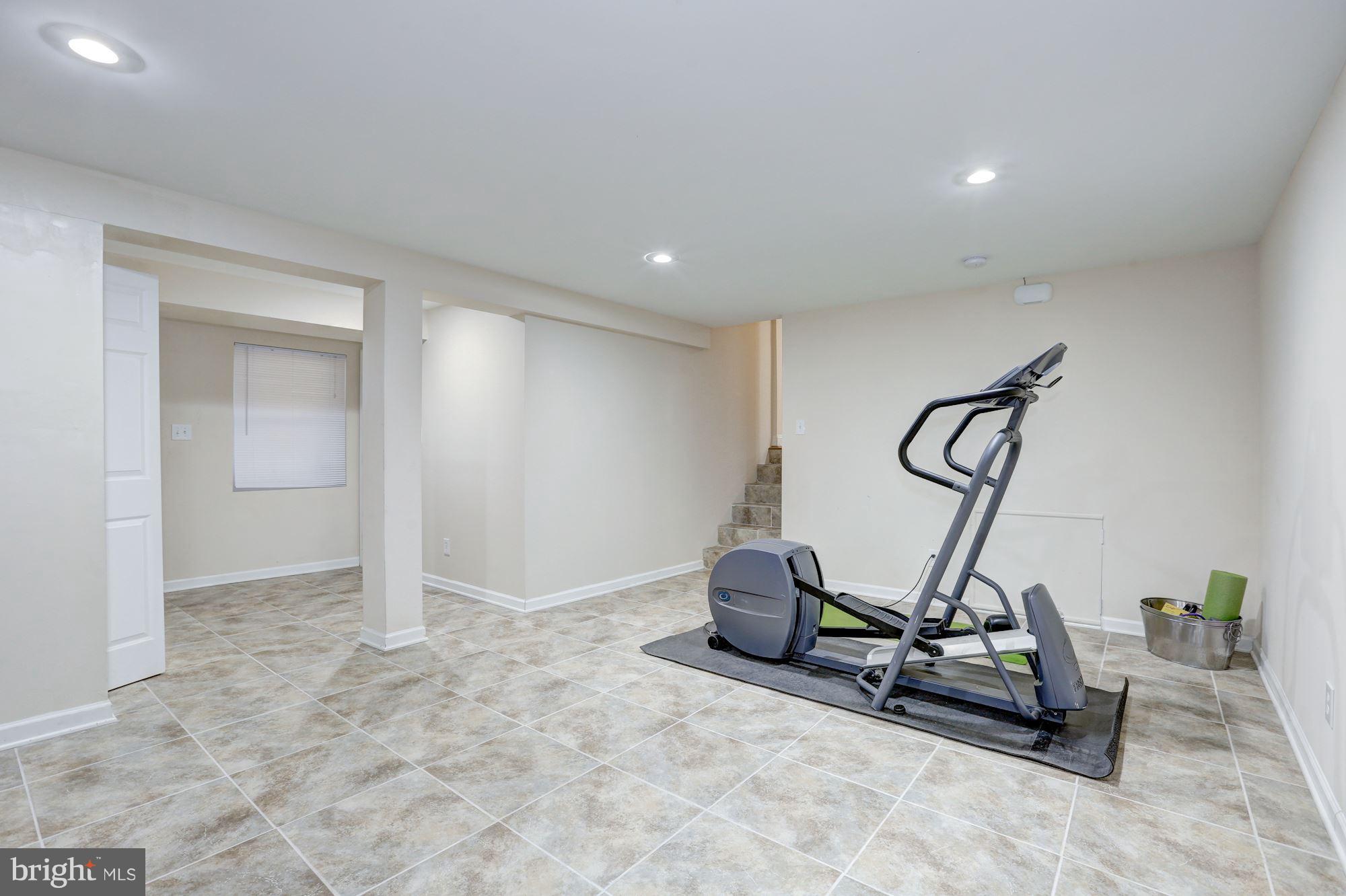 13108 Holdridge Road Silver Spring, MD 20906 - Photo 23 of 30 a view of a room with gym equipment