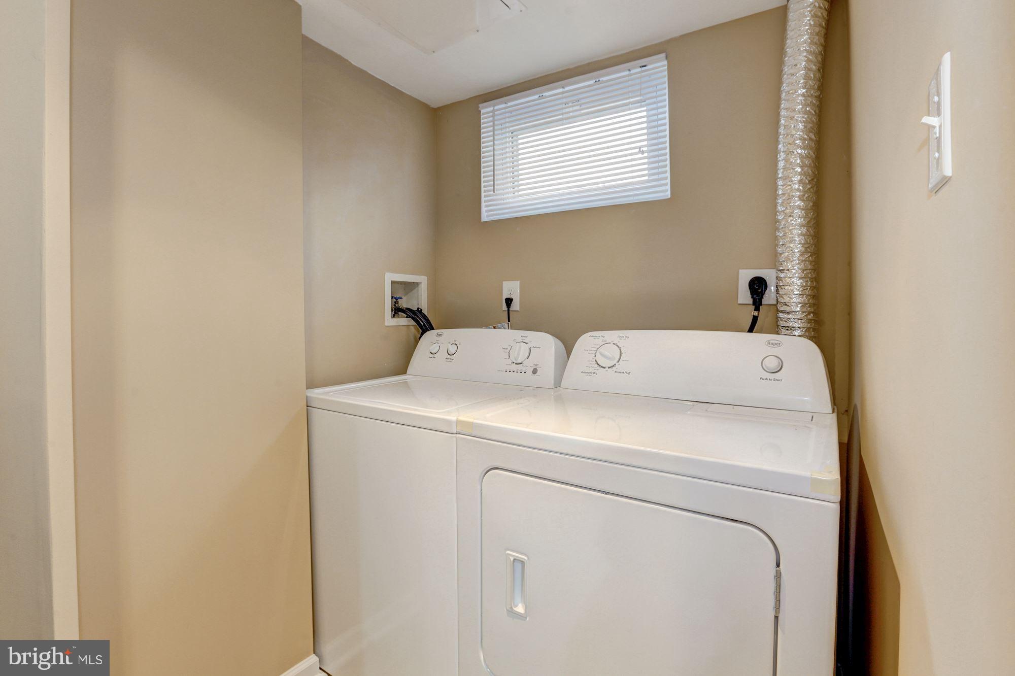 13108 Holdridge Road Silver Spring, MD 20906 - Photo 24 of 30 a utility room with dryer and washer