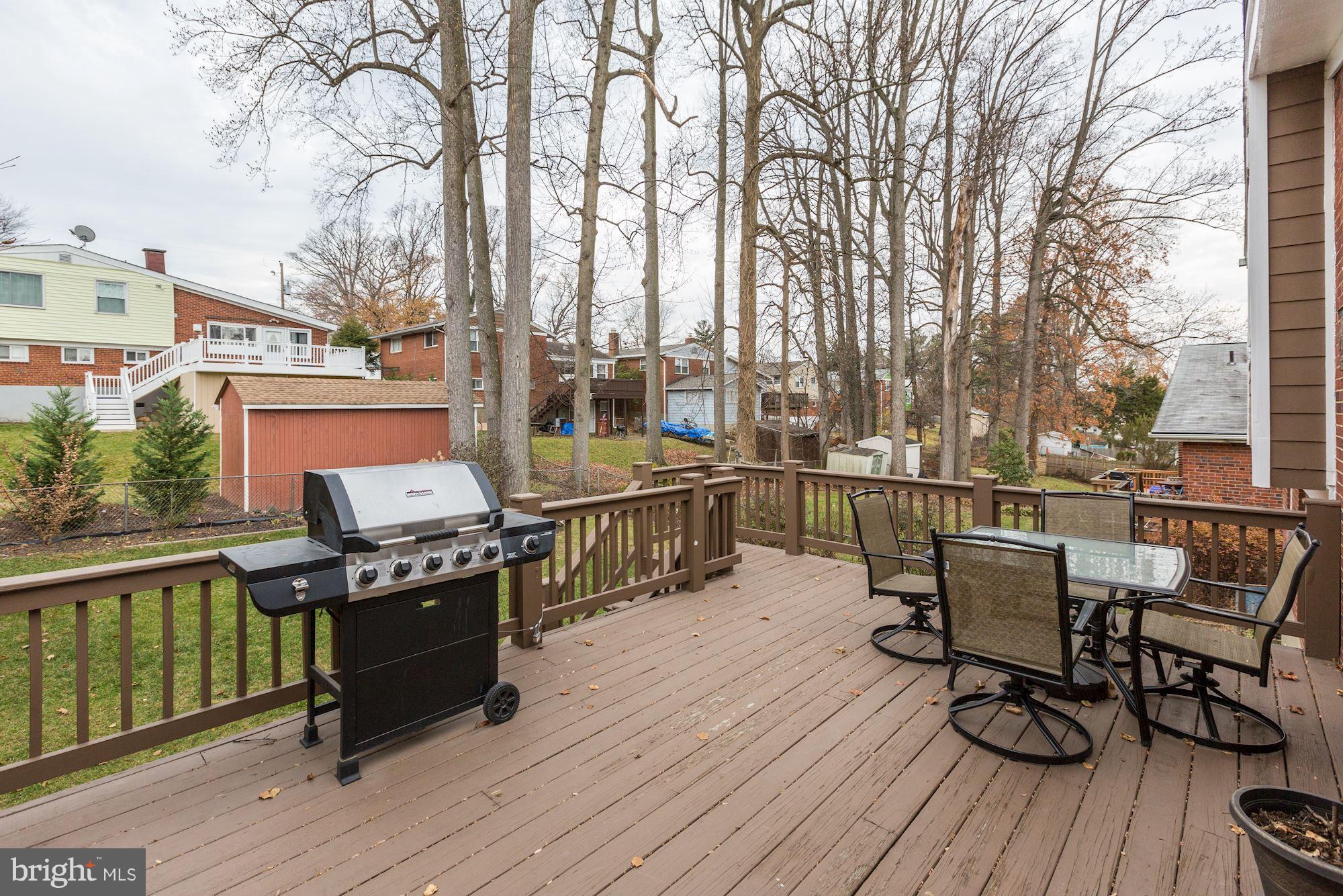 13108 Holdridge Road Silver Spring, MD 20906 - Photo 25 of 30 a view of a chairs on wooden deck