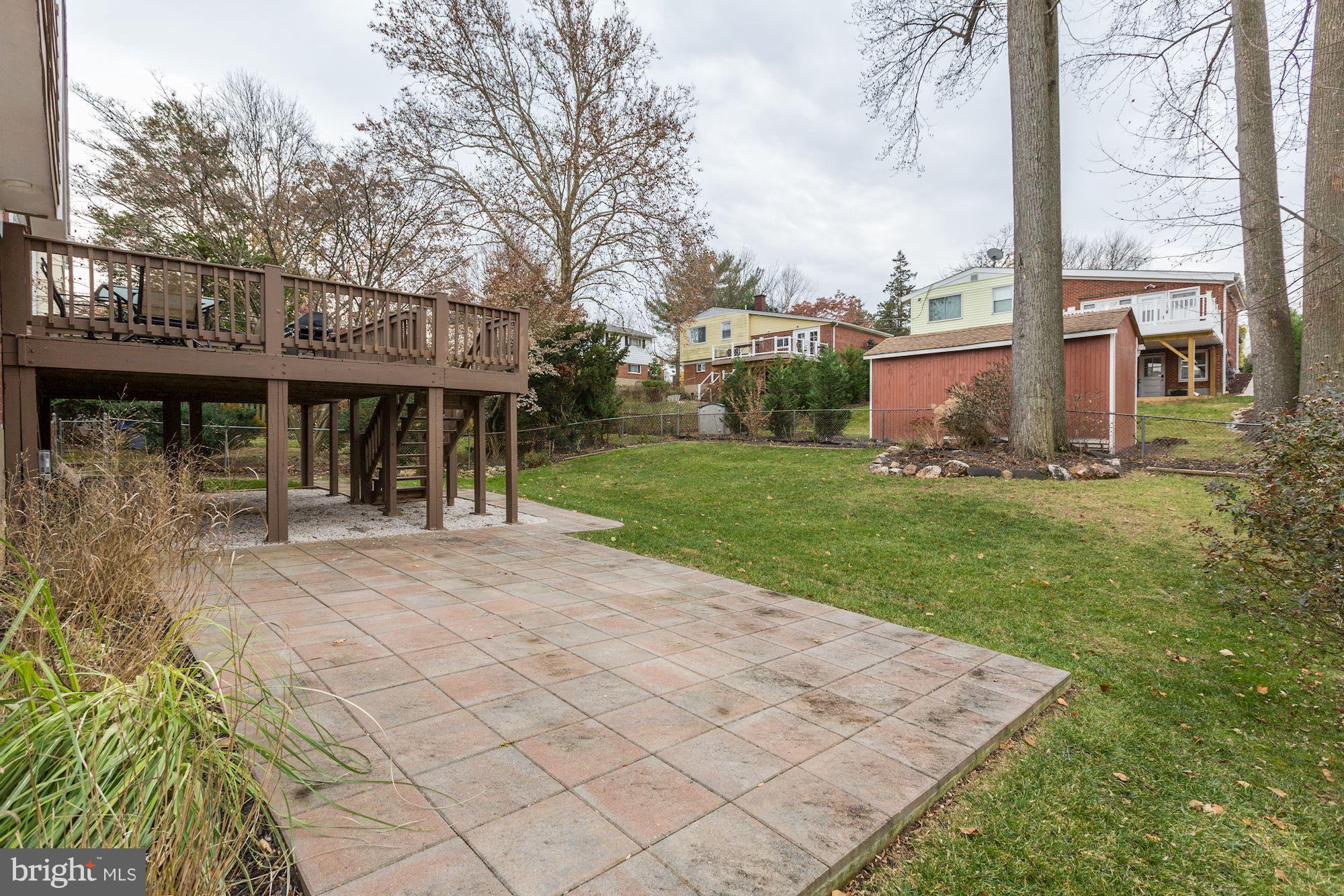 13108 Holdridge Road Silver Spring, MD 20906 - Photo 28 of 30 a view of a house with a yard and sitting area