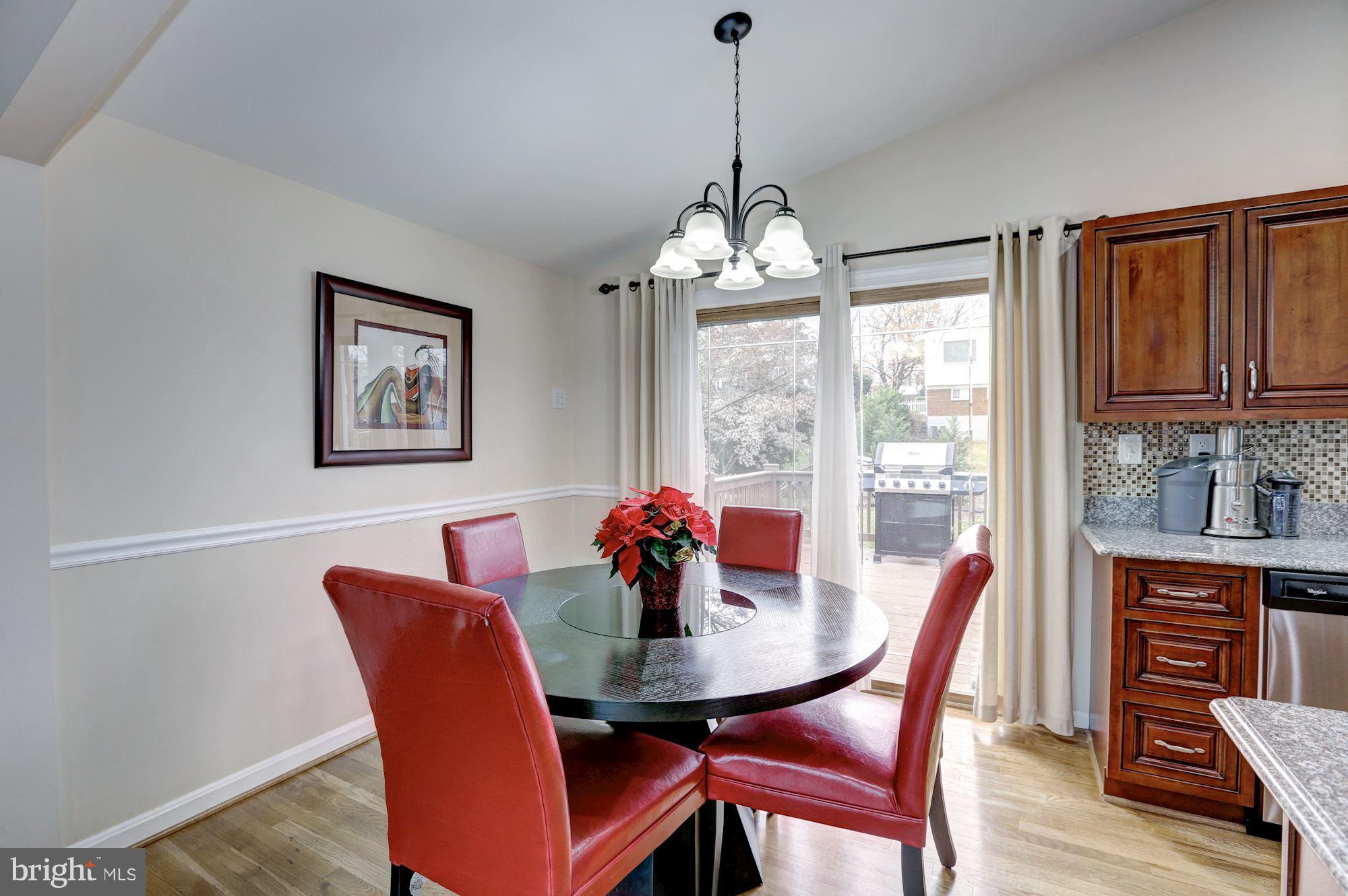 13108 Holdridge Road Silver Spring, MD 20906 - Photo 6 of 30 a view of a dining room with furniture window and outside view