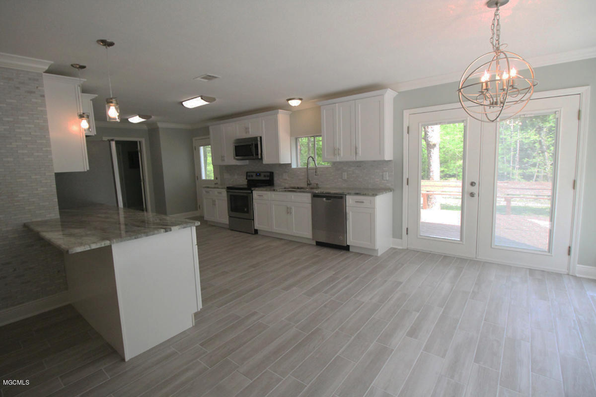 23224 Red Bluff Road Moss Point, MS 39562 - Photo 12 of 52 Kitchen and Dining