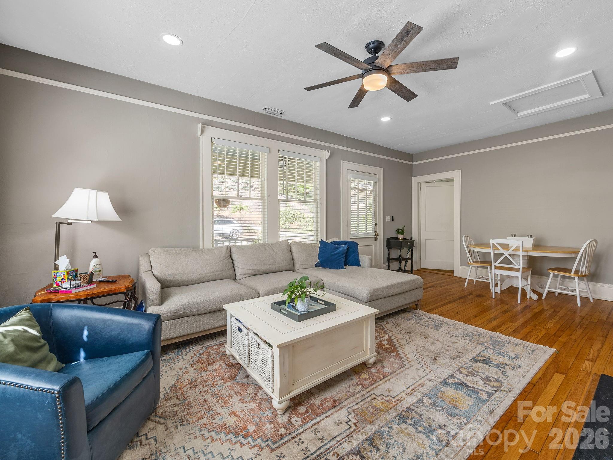110 Grady Avenue Tryon, NC 28782 - Photo 11 of 41 a living room with furniture and a table