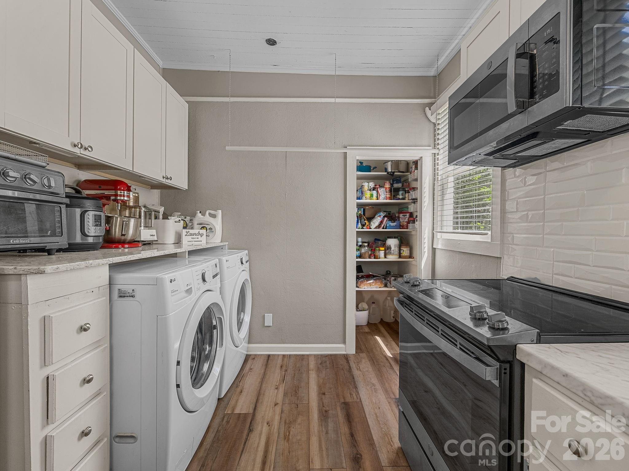 110 Grady Avenue Tryon, NC 28782 - Photo 19 of 41 a utility room with dryer and washer