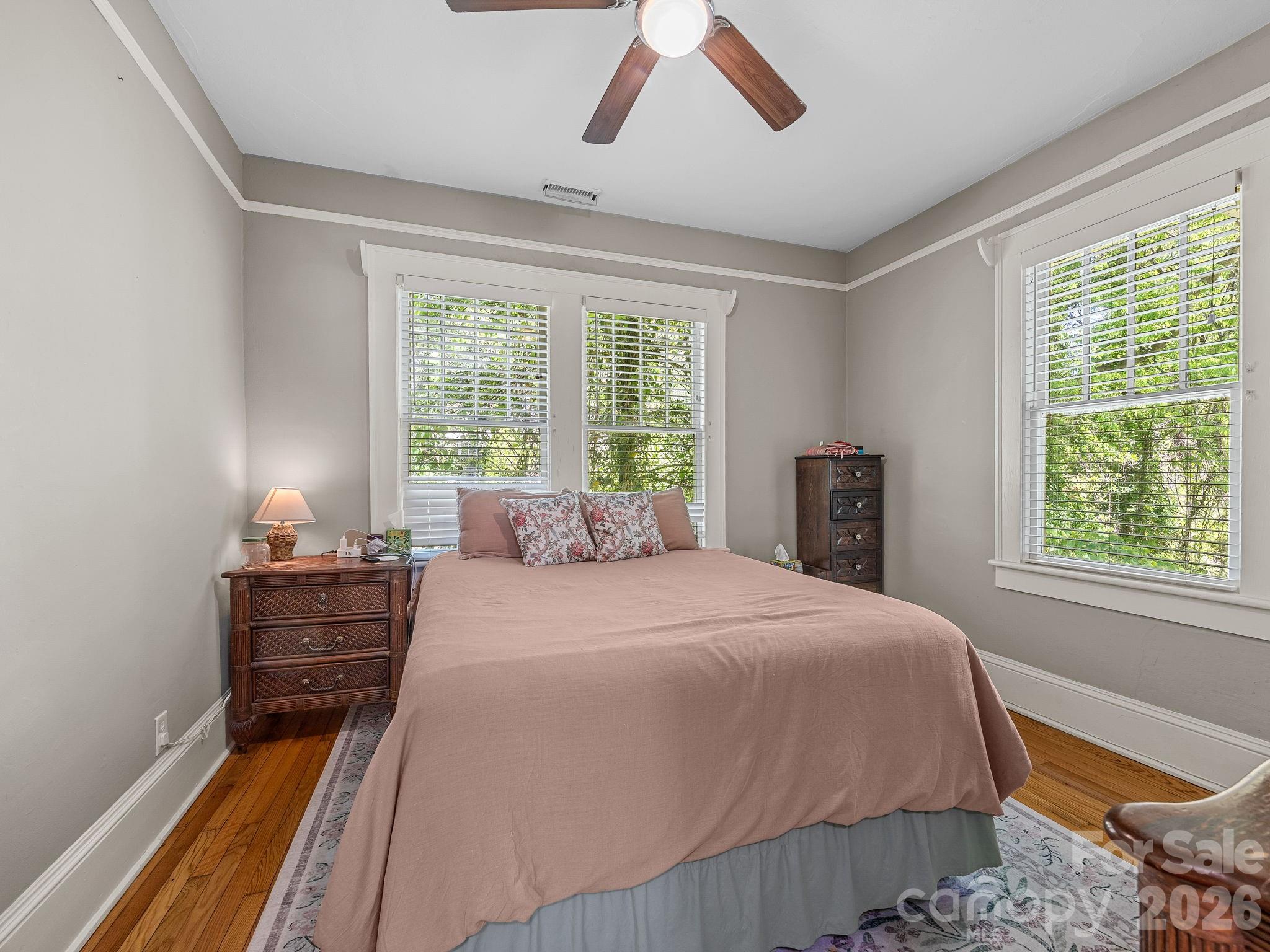 110 Grady Avenue Tryon, NC 28782 - Photo 20 of 41 a bedroom with a bed and a window