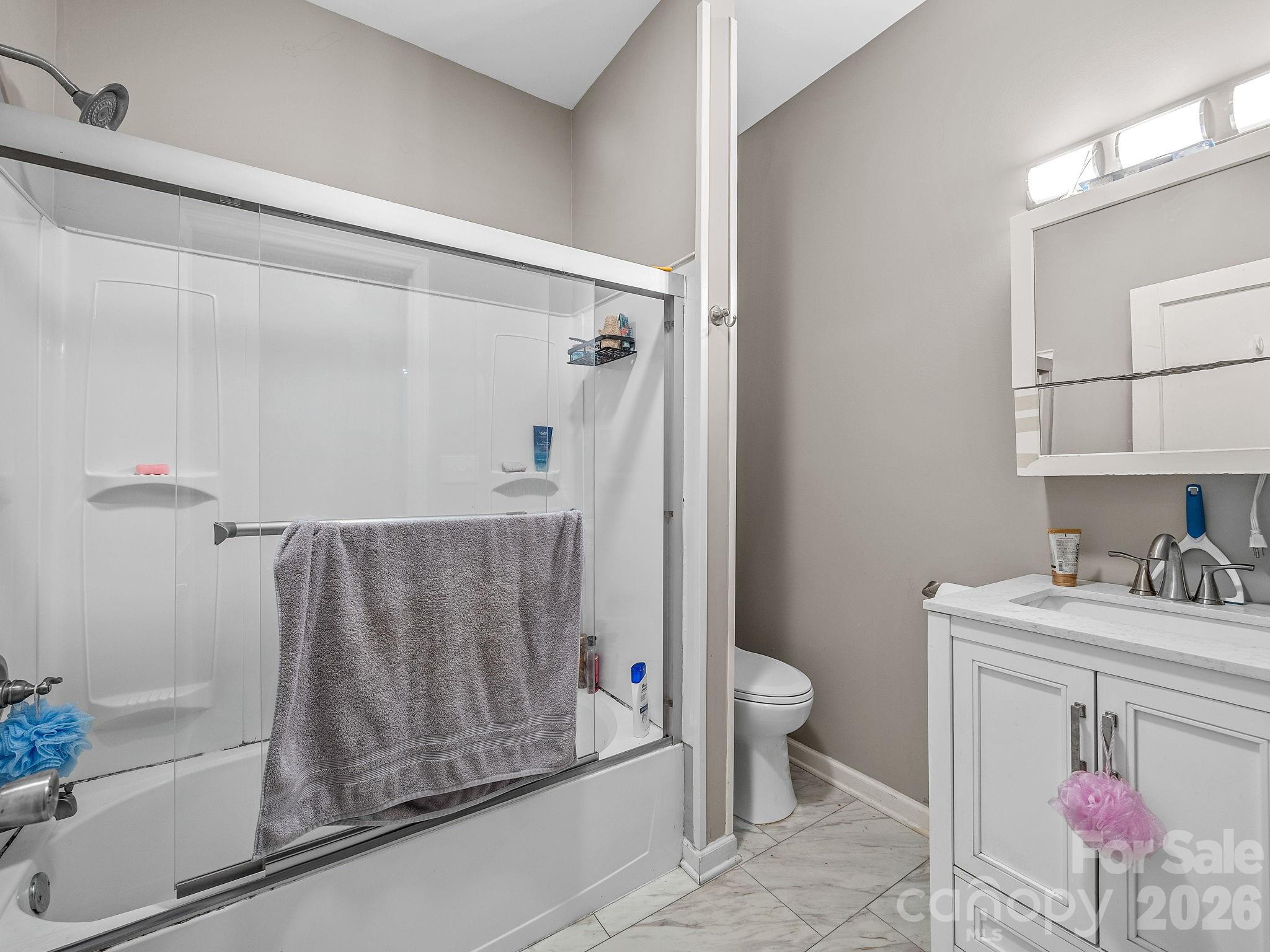 110 Grady Avenue Tryon, NC 28782 - Photo 34 of 41 a bathroom with a sink toilet and shower