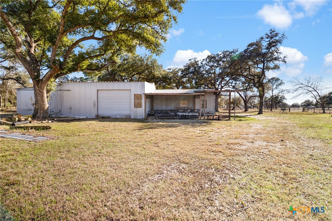 1465 County Road 401 Edna, TX 77957 - Photo 8 of 46 a view of a house with a yard
