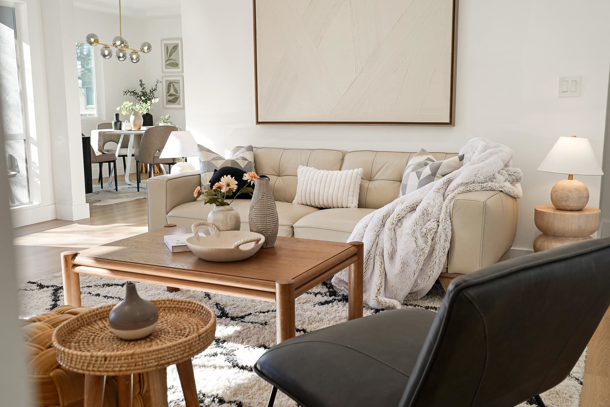 2151 Santa Rita Street Oakland, CA 94601 - Photo 4 of 46 Living room with light wood-style floors and a chandelier
