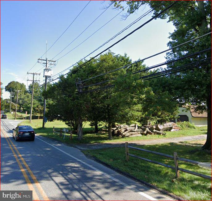 631 Old Court Road Windsor Mill, MD 21244 - Photo 7 of 7 a cars parked on the side of the road