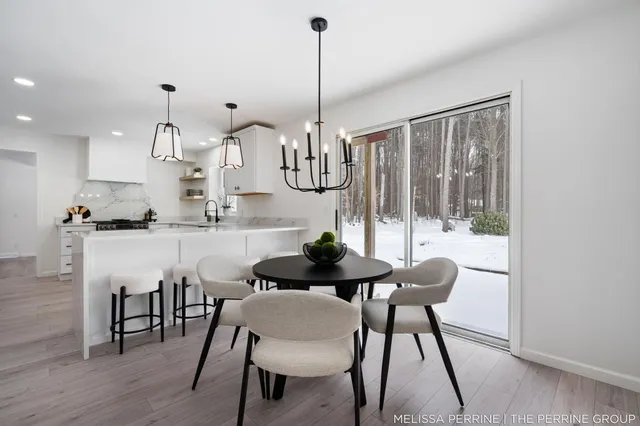 $670,000 | 8930 Hanna Lake Avenue Southeast, Caledonia, MI 49316