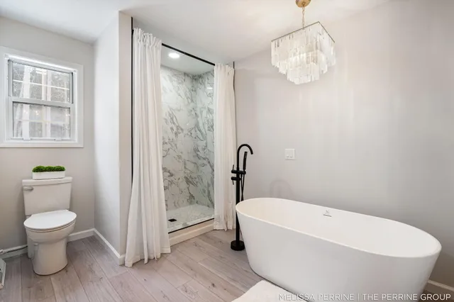 $670,000 | 8930 Hanna Lake Avenue Southeast, Caledonia, MI 49316