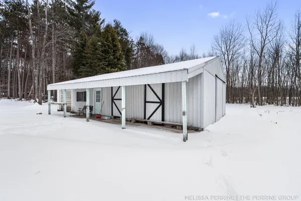 $670,000 | 8930 Hanna Lake Avenue Southeast, Caledonia, MI 49316