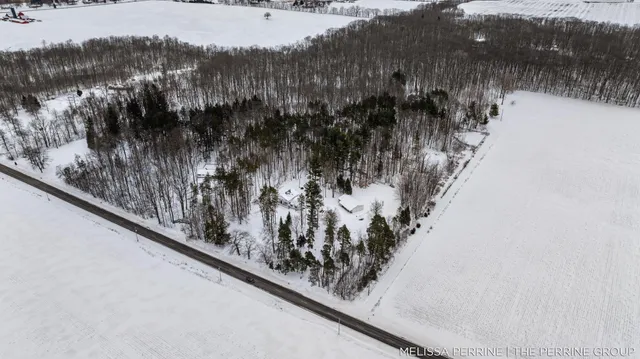 $670,000 | 8930 Hanna Lake Avenue Southeast, Caledonia, MI 49316