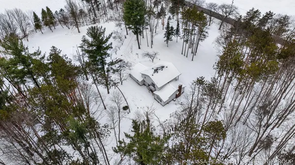 $670,000 | 8930 Hanna Lake Avenue Southeast, Caledonia, MI 49316