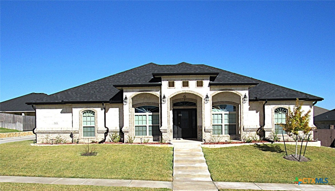 7606 Palladium Loop Killeen, TX 76542 - Photo 1 of 28 a front view of a house with a yard