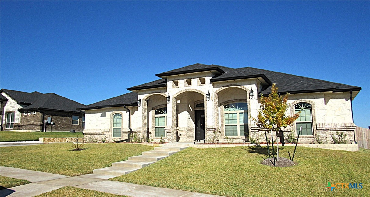 7606 Palladium Loop Killeen, TX 76542 - Photo 28 of 28 a front view of a house with a yard
