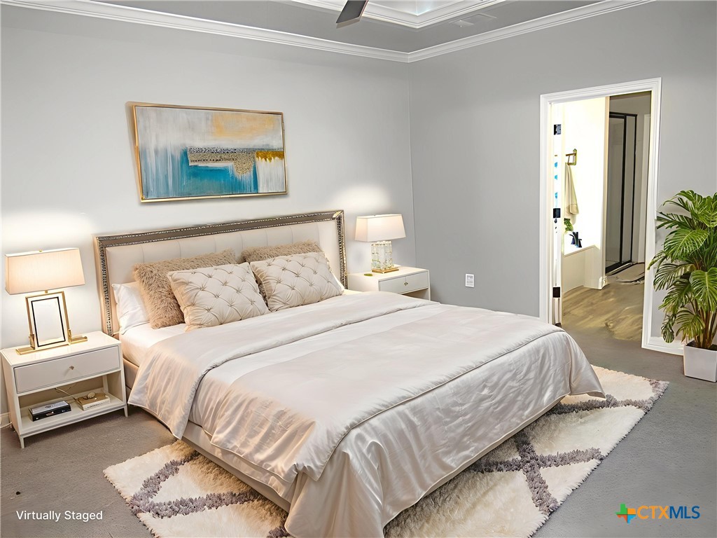 7606 Palladium Loop Killeen, TX 76542 - Photo 10 of 28 a bedroom with a bed and a painting on the wall