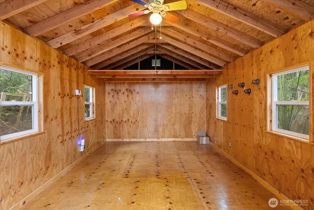 a front view of a house with trees