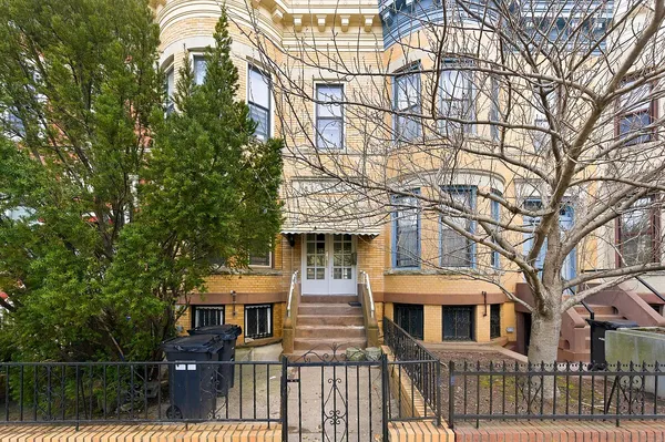 a front view of a house with balcony