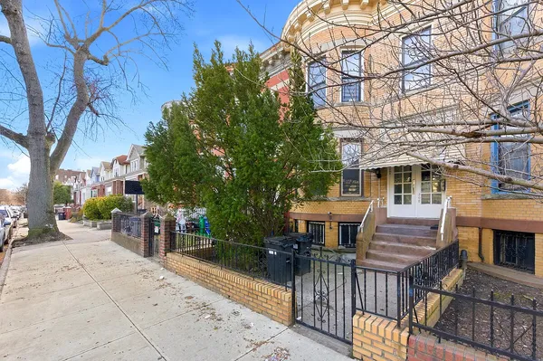 a view of house with outdoor space and seating area