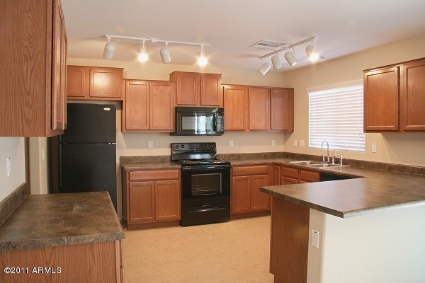 10225 West Camelback Road, Unit 41 Phoenix, AZ 85037 - Photo 3 of 23 Kitchen View 1