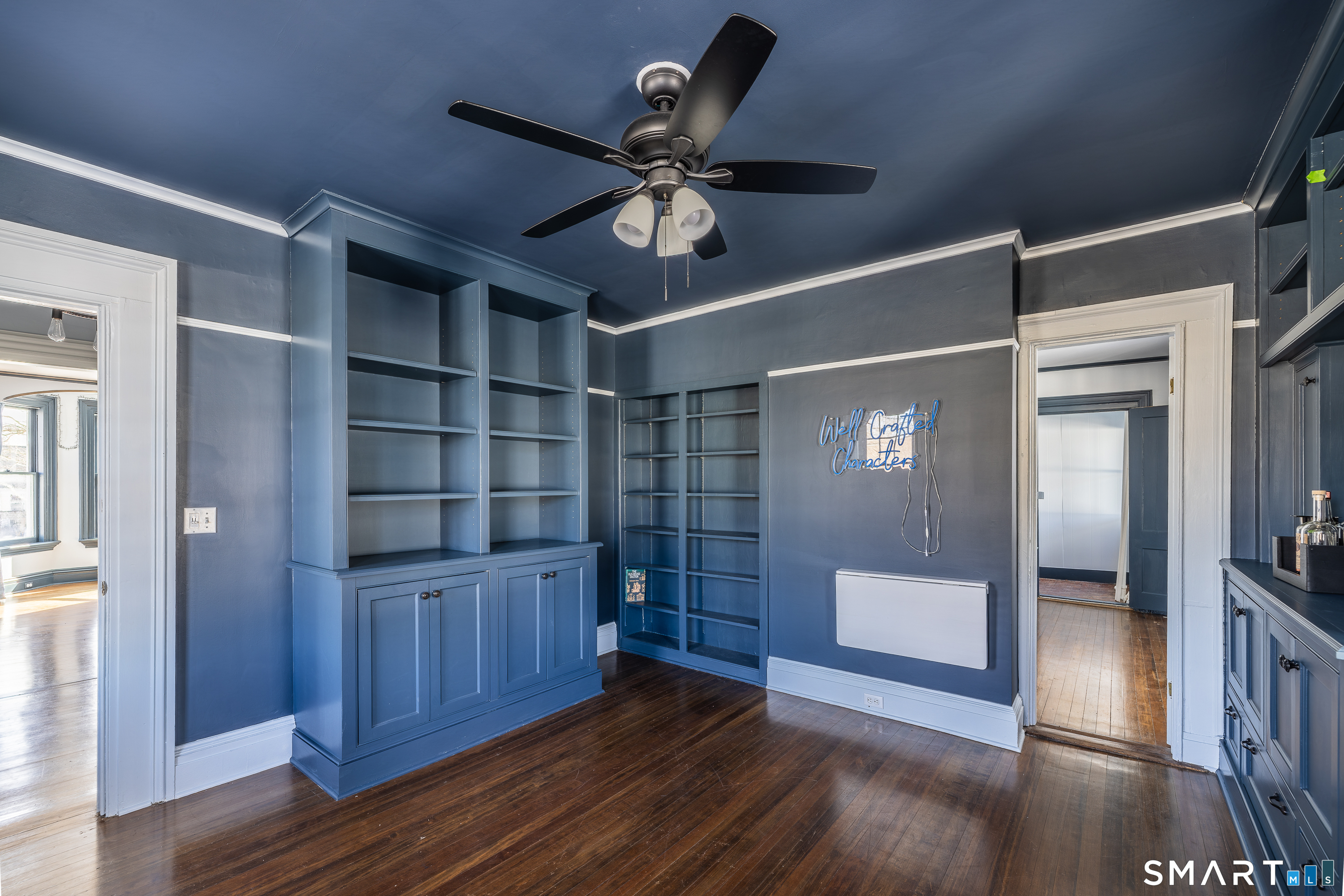 5385 Main Street Trumbull, CT 06611 - Photo 16 of 39 a view of a hallway with wooden floor and closet