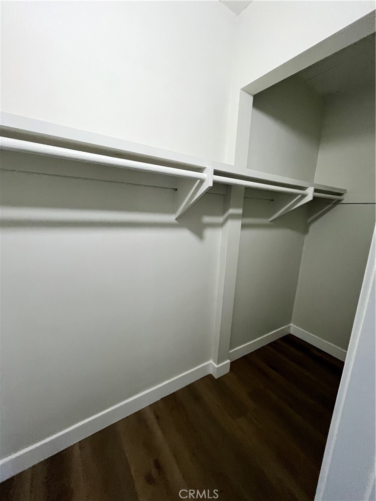 2007 Huntington Lane, Unit 2 Redondo Beach, CA 90278 - Photo 12 of 22 an empty room with wooden floor and closet