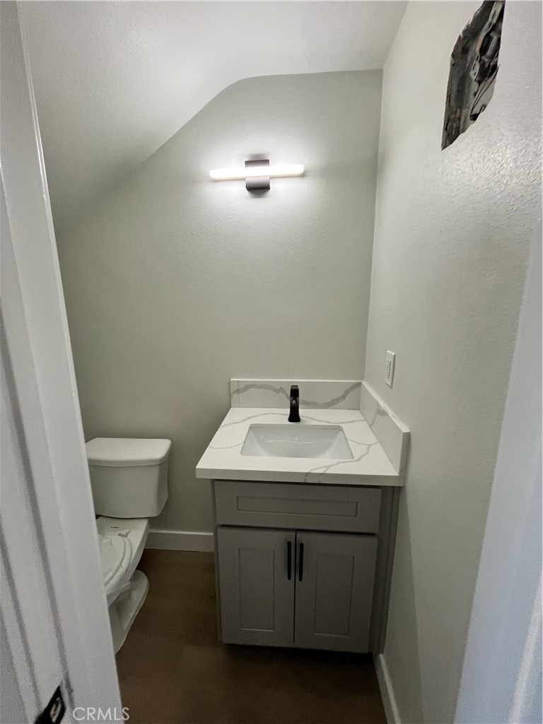 2007 Huntington Lane, Unit 2 Redondo Beach, CA 90278 - Photo 13 of 22 a bathroom with a sink toilet and mirror