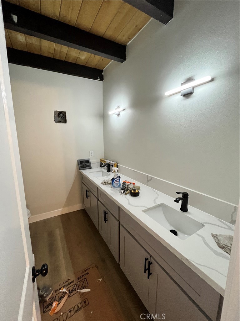 2007 Huntington Lane, Unit 2 Redondo Beach, CA 90278 - Photo 21 of 22 a bathroom with a sink and a mirror