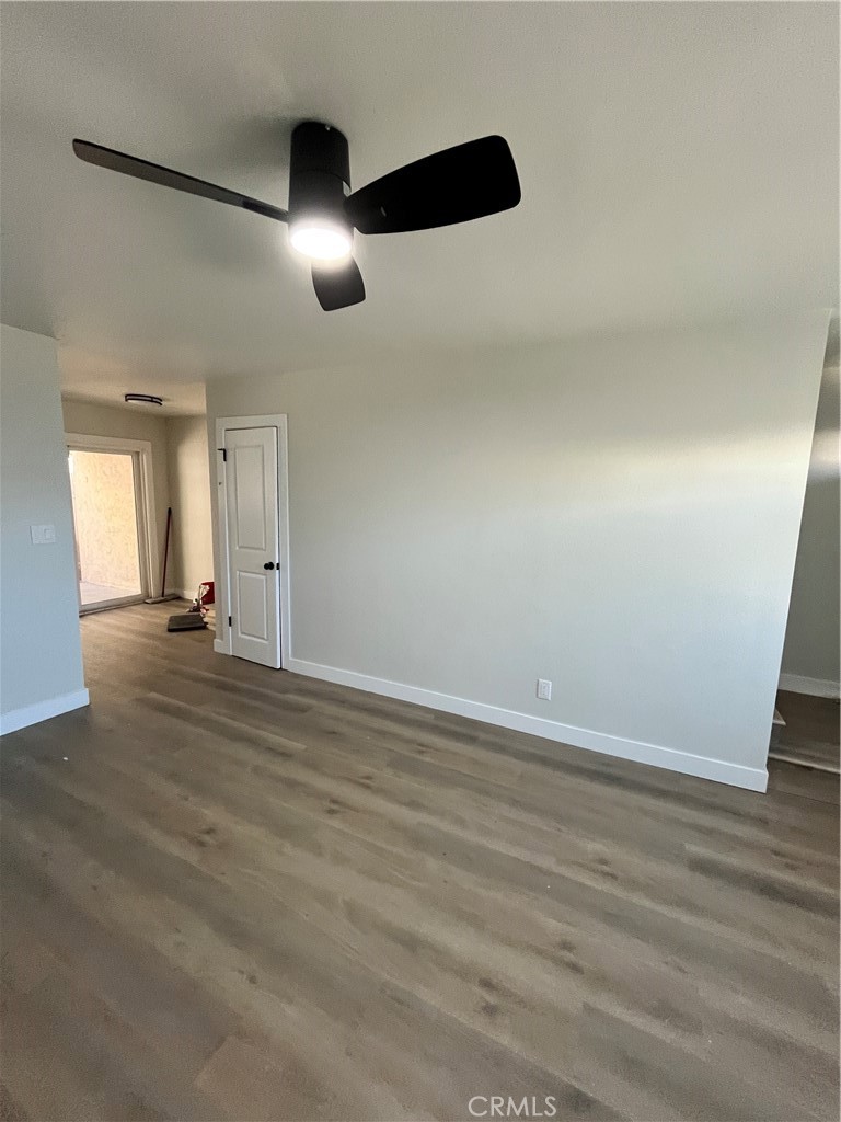 2007 Huntington Lane, Unit 2 Redondo Beach, CA 90278 - Photo 4 of 22 an empty room with wooden floor and windows
