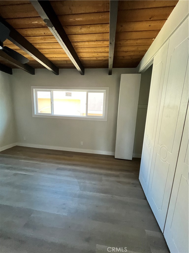 2007 Huntington Lane, Unit 2 Redondo Beach, CA 90278 - Photo 7 of 22 a view of empty room with wooden floor and fan
