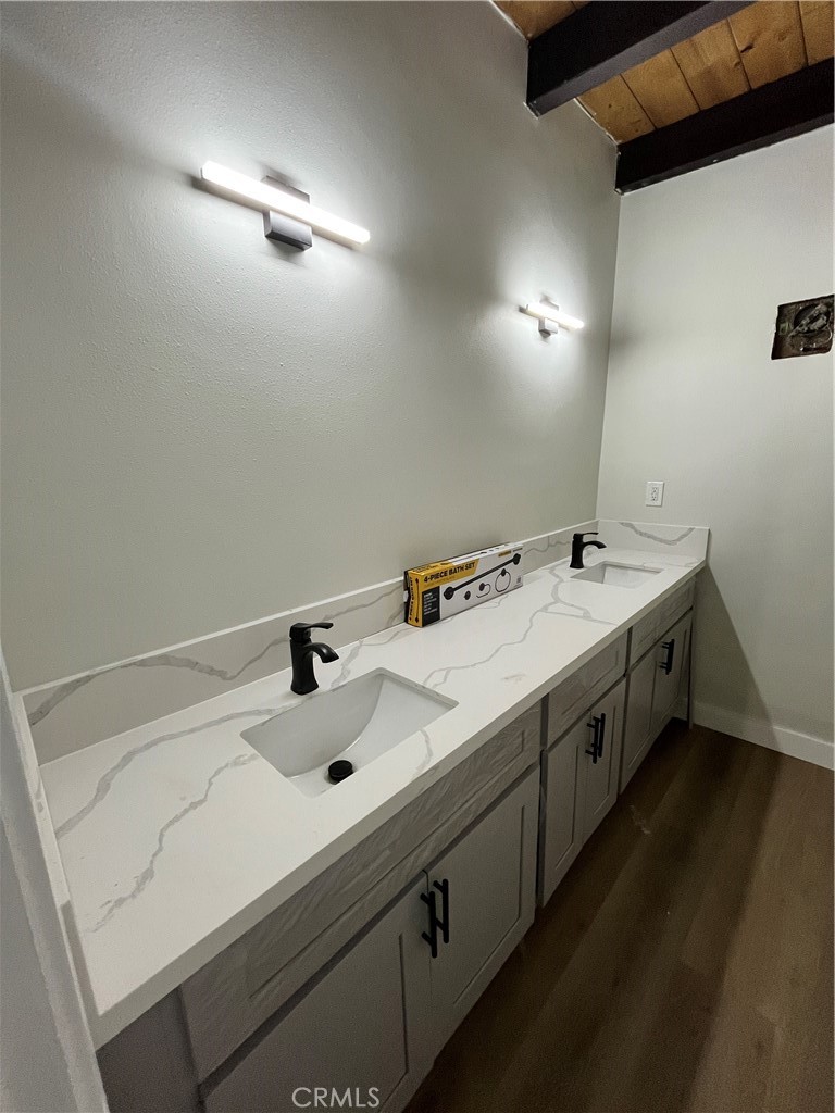 2007 Huntington Lane, Unit 2 Redondo Beach, CA 90278 - Photo 9 of 22 a bathroom with a sink and a mirror