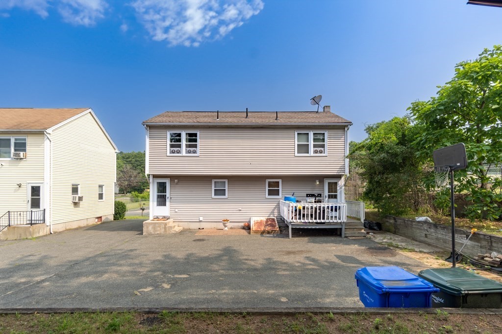 209-211 Verge Street Springfield, MA 01129 - Photo 12 of 14 a view of a house with a patio