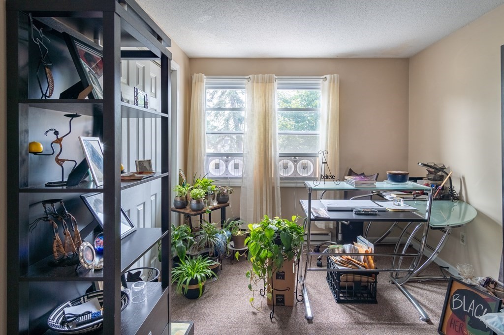 209-211 Verge Street Springfield, MA 01129 - Photo 10 of 14 a view of a workspace with furniture